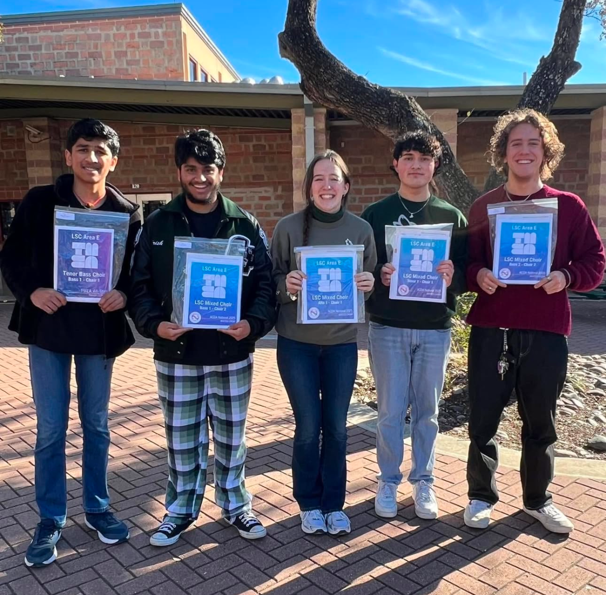 
Holding their awards, the choir members pose for a photo after placing All-State. On Jan. 11-12, the choir went to San Antonio to compete in the All-State choir auditions. Five students came back placing, with one of them being the first freshman to place in seven years. “It’s such an honor to be the first freshman All-Stater in seven years,” freshman Adithya Muthukumar said. “I couldn’t have made it if it weren’t for all the work my directors, my voice lesson teachers, the encouragement of my mom and dad and especially my older brother.”
Photo courtesy of Carlos Guerreo